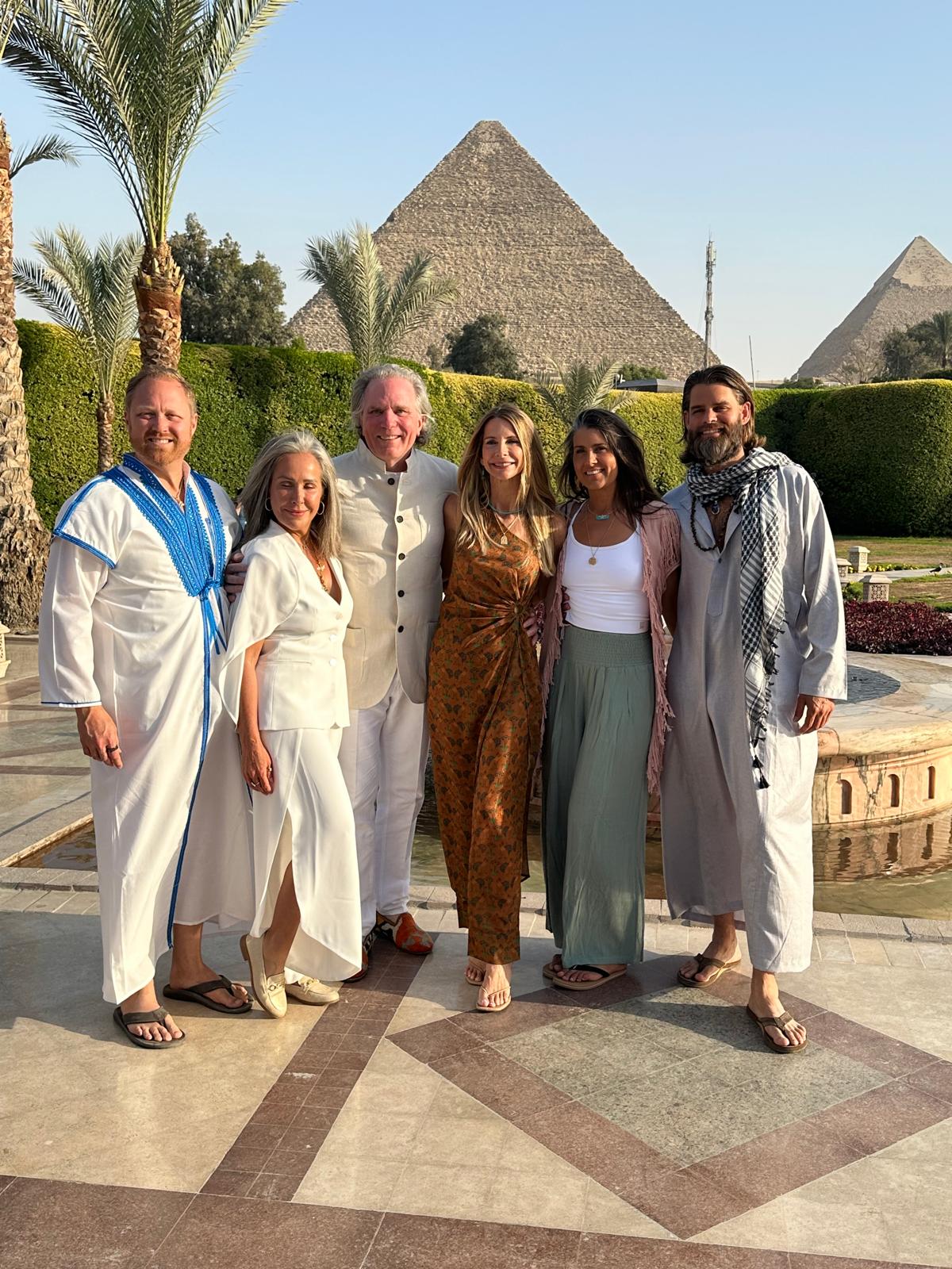 Group at Mena House with pyramids